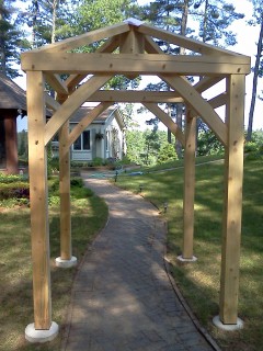 timber frame arbor with hip rafter